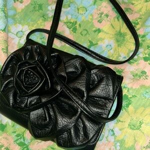 Giannini genuine faux leather crossbody bag.